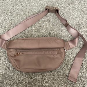A new day (target brand) sling chest bag/Fanny pack in a beautiful caramel color